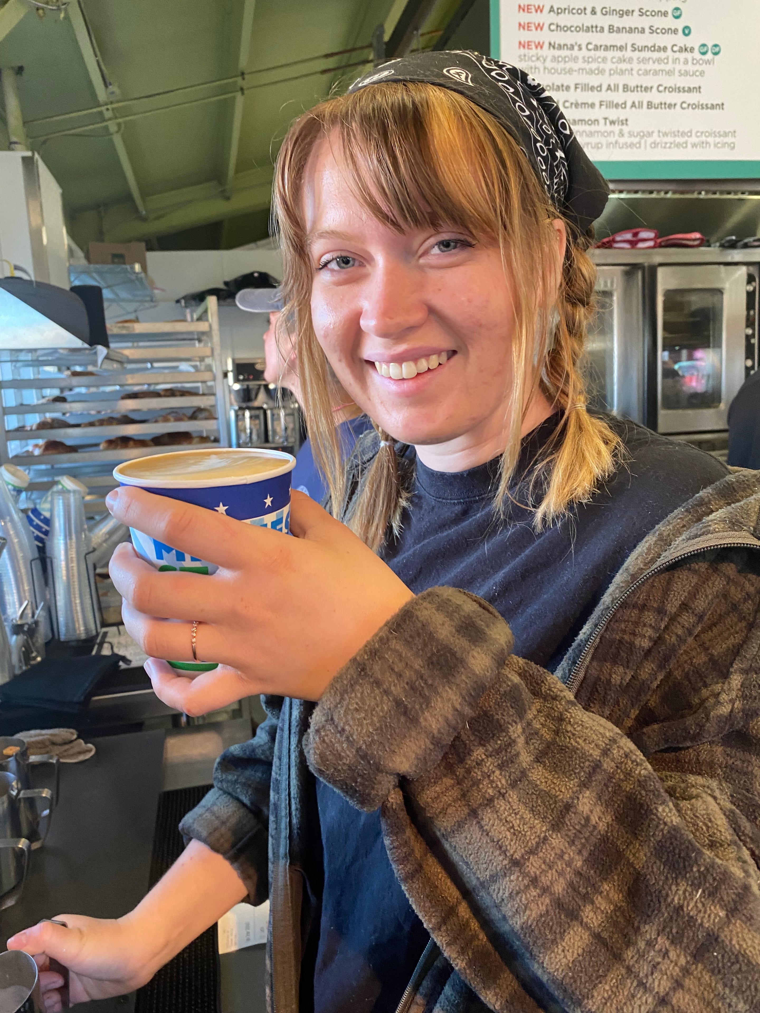 French Meadow staff member serving coffee at the Fair